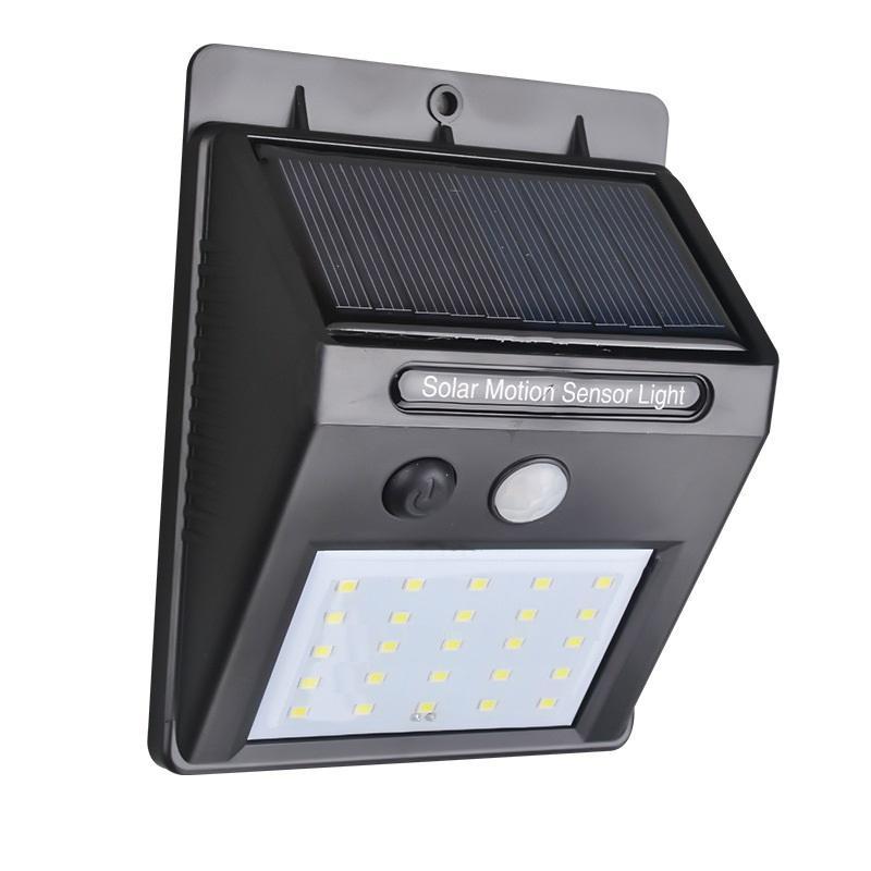 Black Wukusy 213 Solar Security LED Night Light with 20 LEDs for outdoor garden wall and home security illumination.