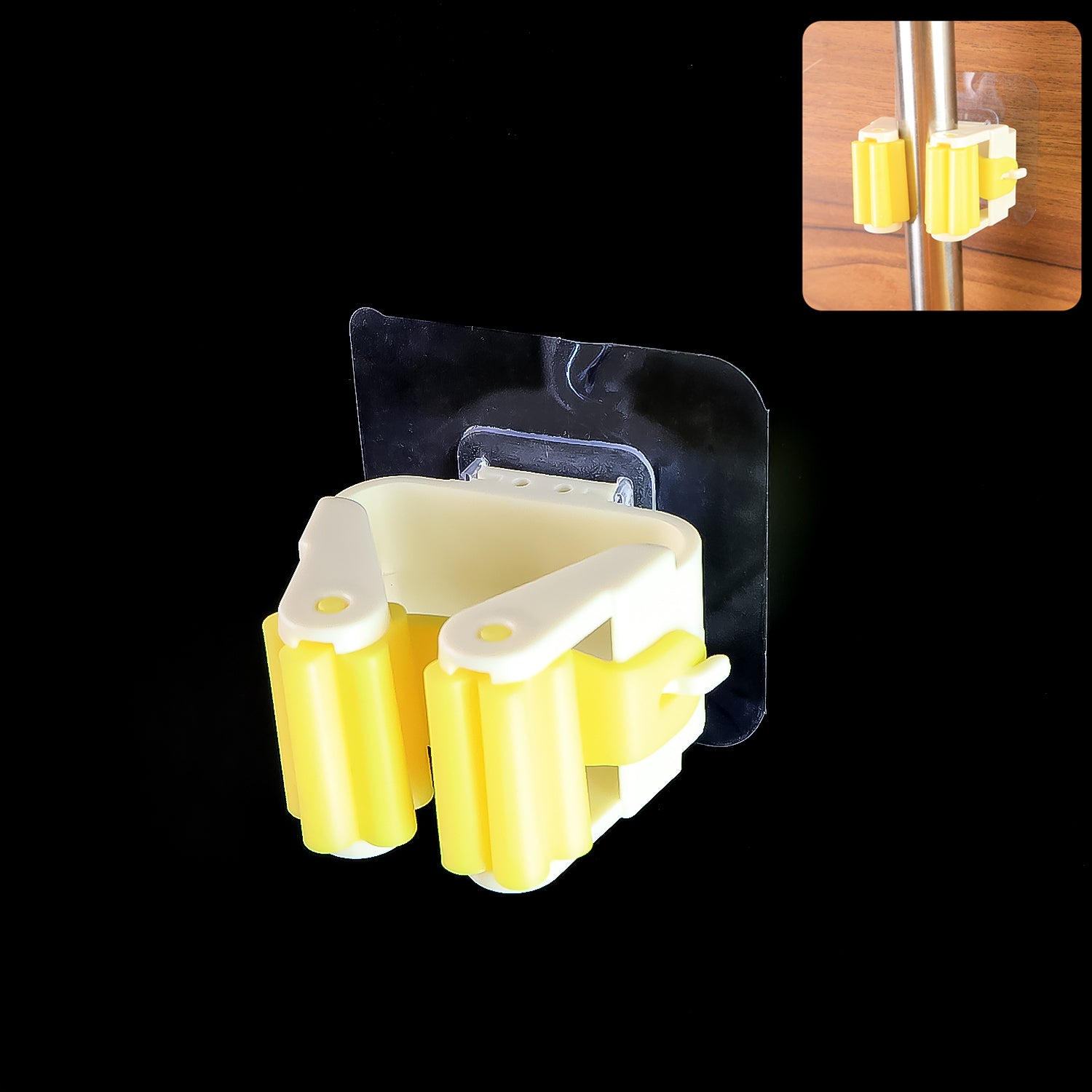 Wukusy Magic Sticker Series self-adhesive mop and broom holder for home organization, mounted on a wall.