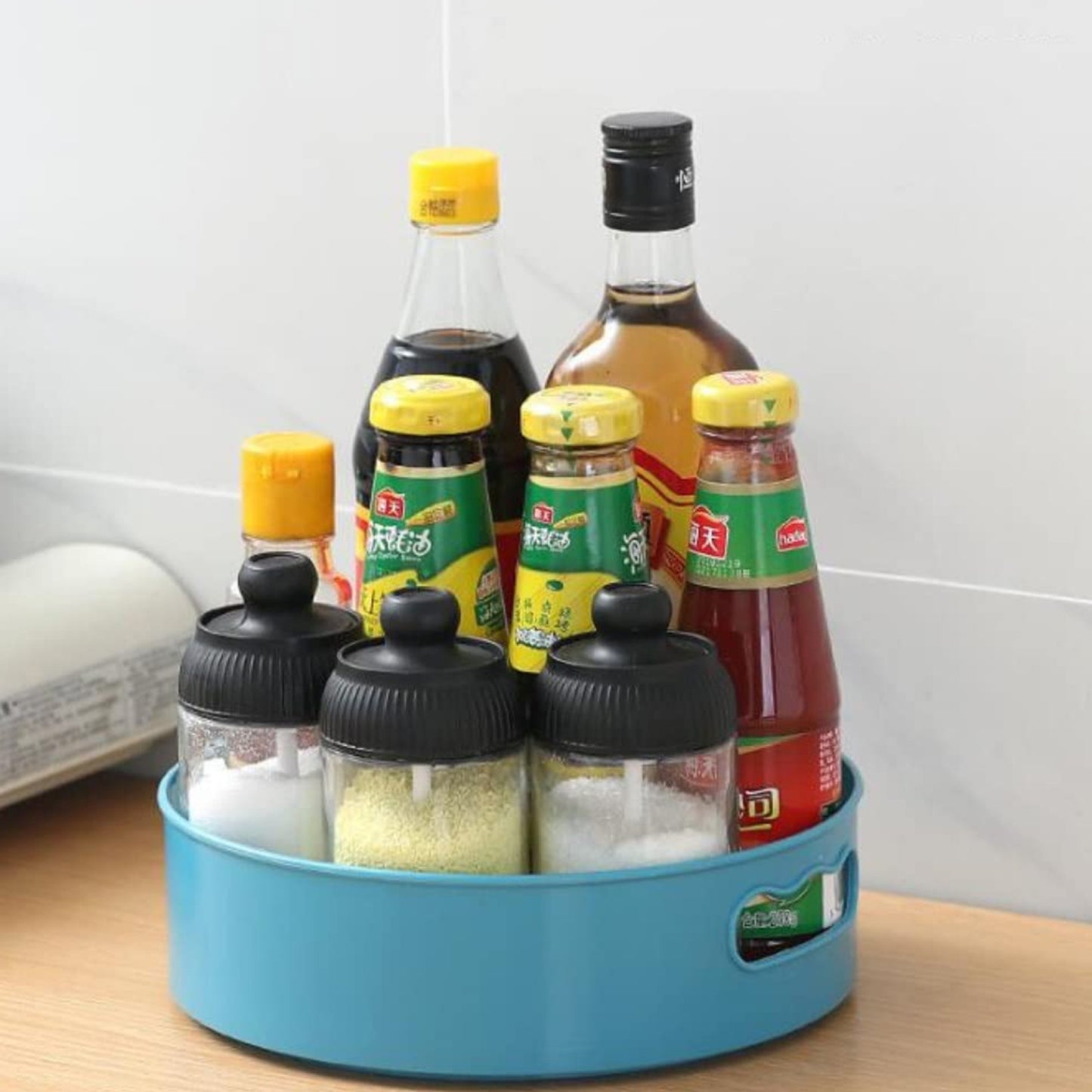 Wukusy 360-degree rotating kitchen organizer trolley with revolving tray, ideal for storage and dining table organization.