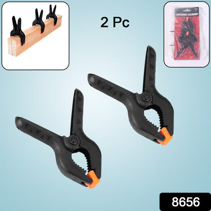 Wukusy 3-inch heavy-duty spring clamps set, durable metal clips for home improvement projects, shown in a close-up image.