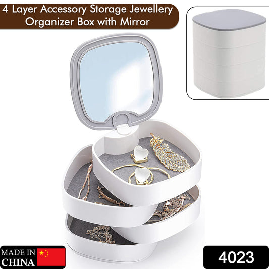 Wukusy 4-layer rotating jewelry box with mirror, multicolor, for organizing earrings, necklaces, and accessories.