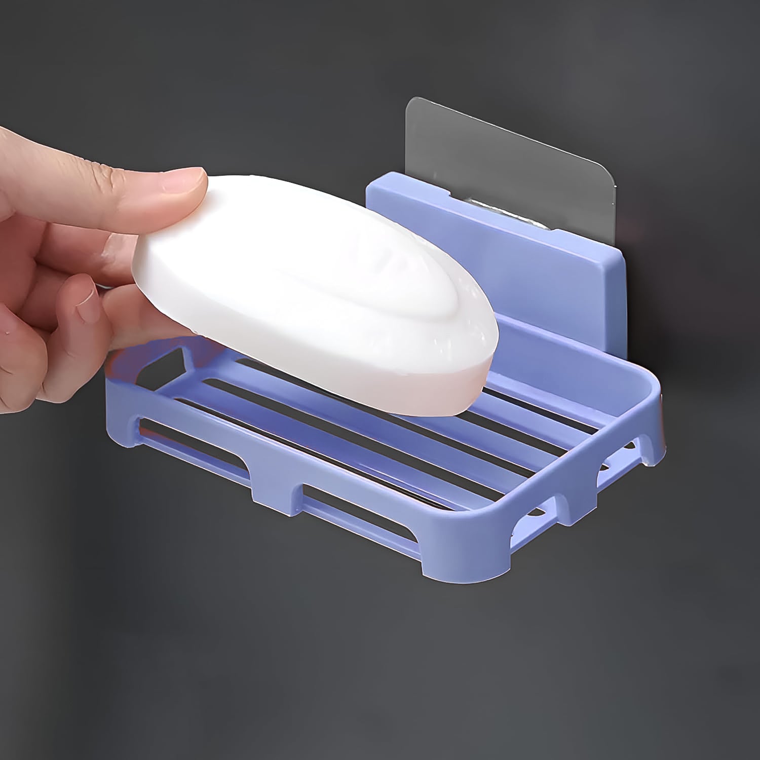 Wukusy wall-mounted plastic soap dish holder for bathroom or kitchen, with self-adhesive design and sponge storage tray.