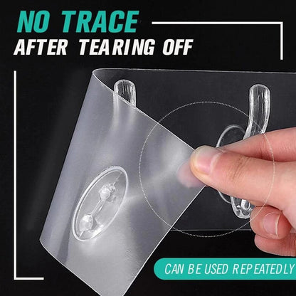 Wukusy 4654 adhesive transparent heavy-duty wall hook for home improvement, mounted on a wall for hanging items.