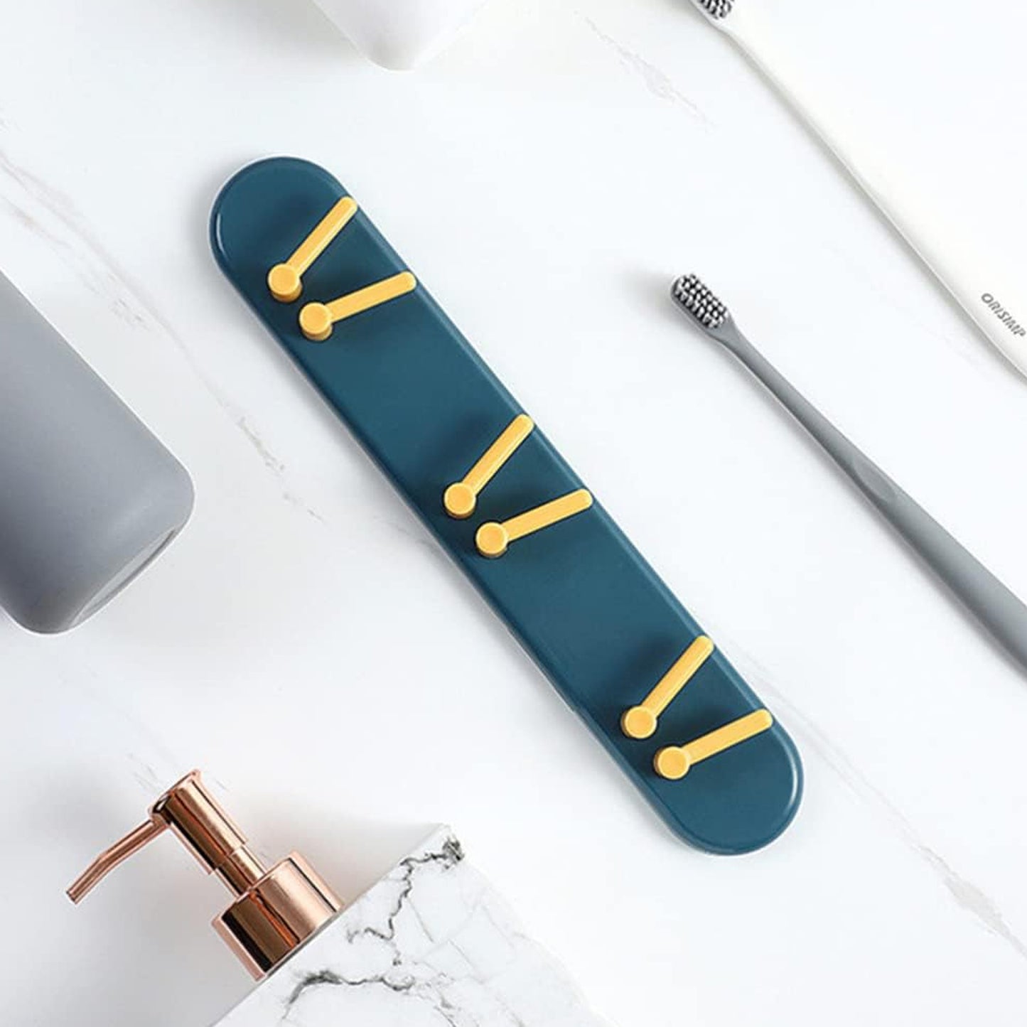 Wukusy plastic toothbrush holder and bathroom organizer with wall-mounted shelf and hooks for bathroom storage.