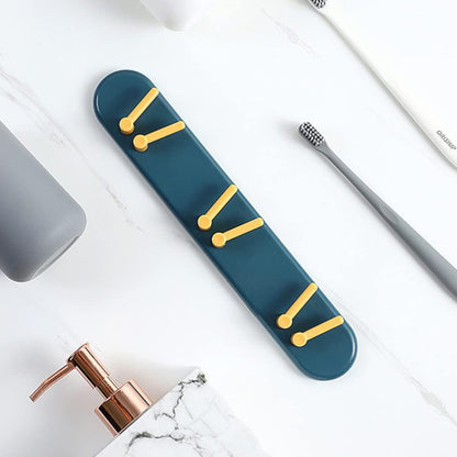 Wukusy plastic toothbrush holder and bathroom organizer with wall-mounted shelf and hooks for bathroom storage.