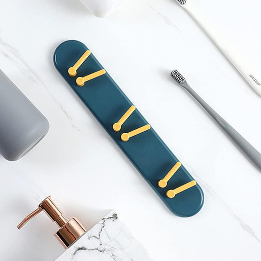 Wukusy plastic toothbrush holder and bathroom organizer with wall-mounted shelf and hooks for bathroom storage.