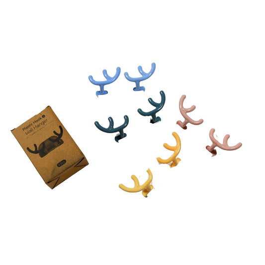 Wukusy plastic wall hanger hooks with adhesive backing, premium quality wall hooks, pack of 4 for home organization and storage.