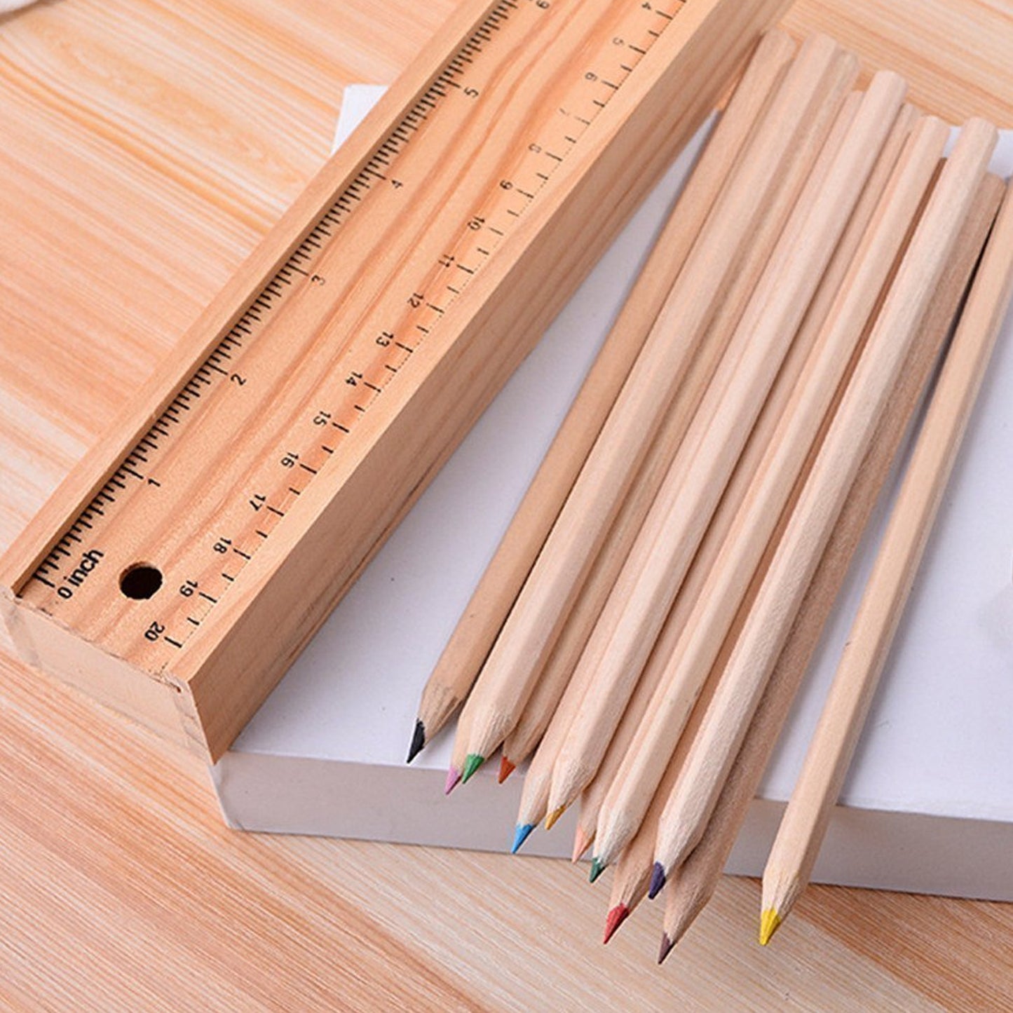 Colorful wooden pencil set with pencil box, ruler, and sharpener by Wukusy, designed for kids, artists, and architects.