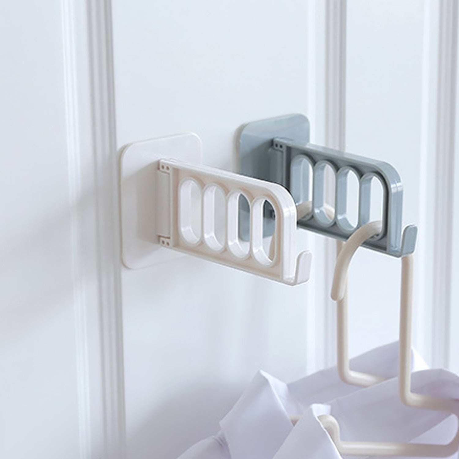 Wukusy single door hook for bathroom, kitchen, or bedroom cubicle, mounted on a door for hanging towels or accessories.