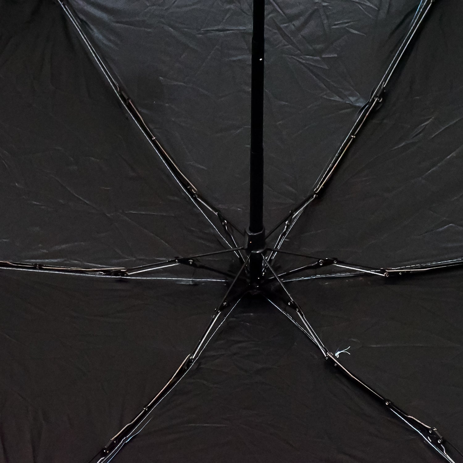 Wukusy 5-fold manual open umbrella with capsule case, compact and portable for home or travel use.