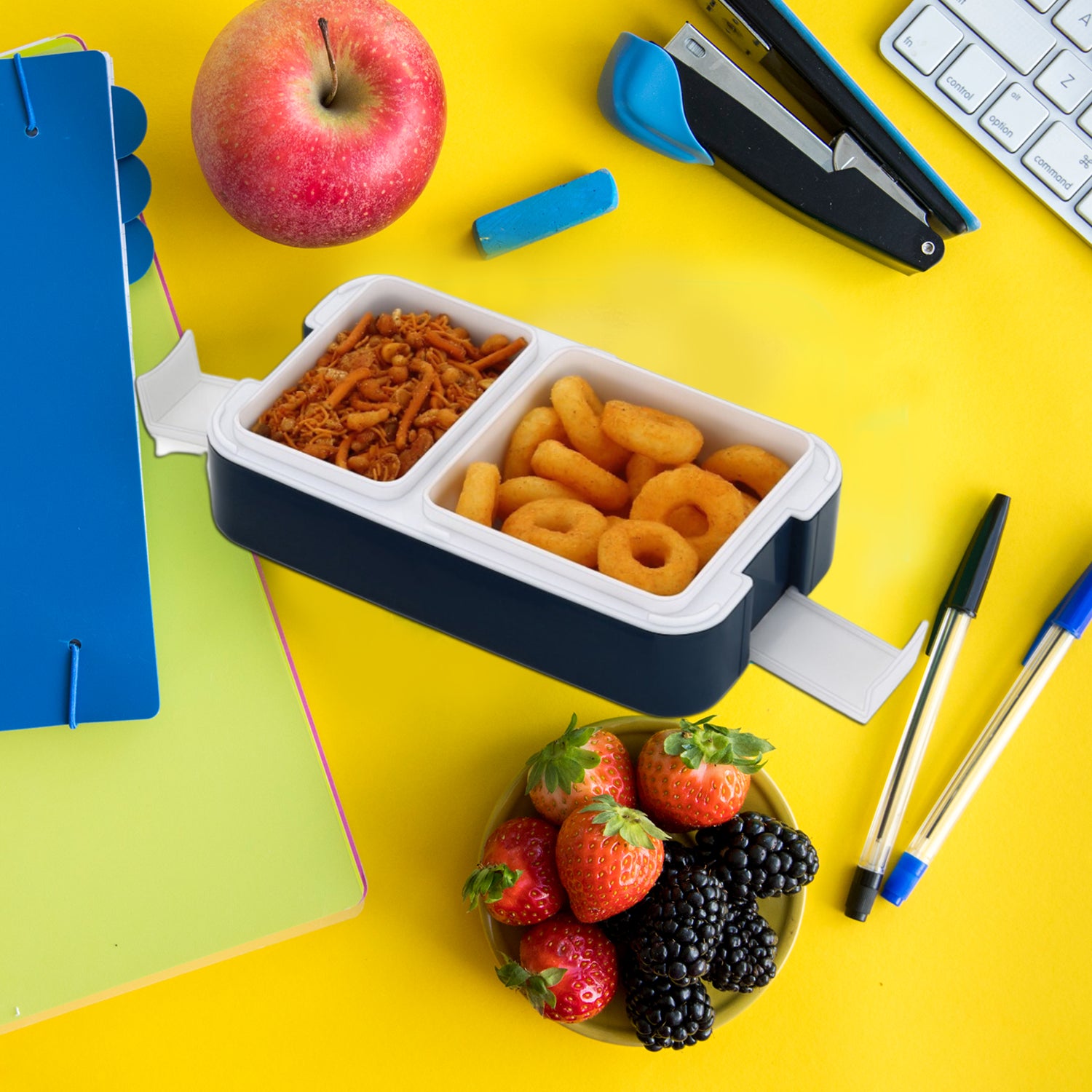 Wukusy 5331 airtight lunch box with two compartments, leak-proof food-grade material, modern design, includes a spoon for convenient packing.