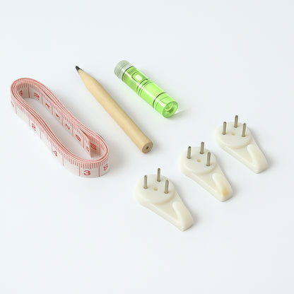Wukusy 6-in-1 wall hanging measurement tool kit for home improvement, includes multiple tools for accurate measuring and hanging.
