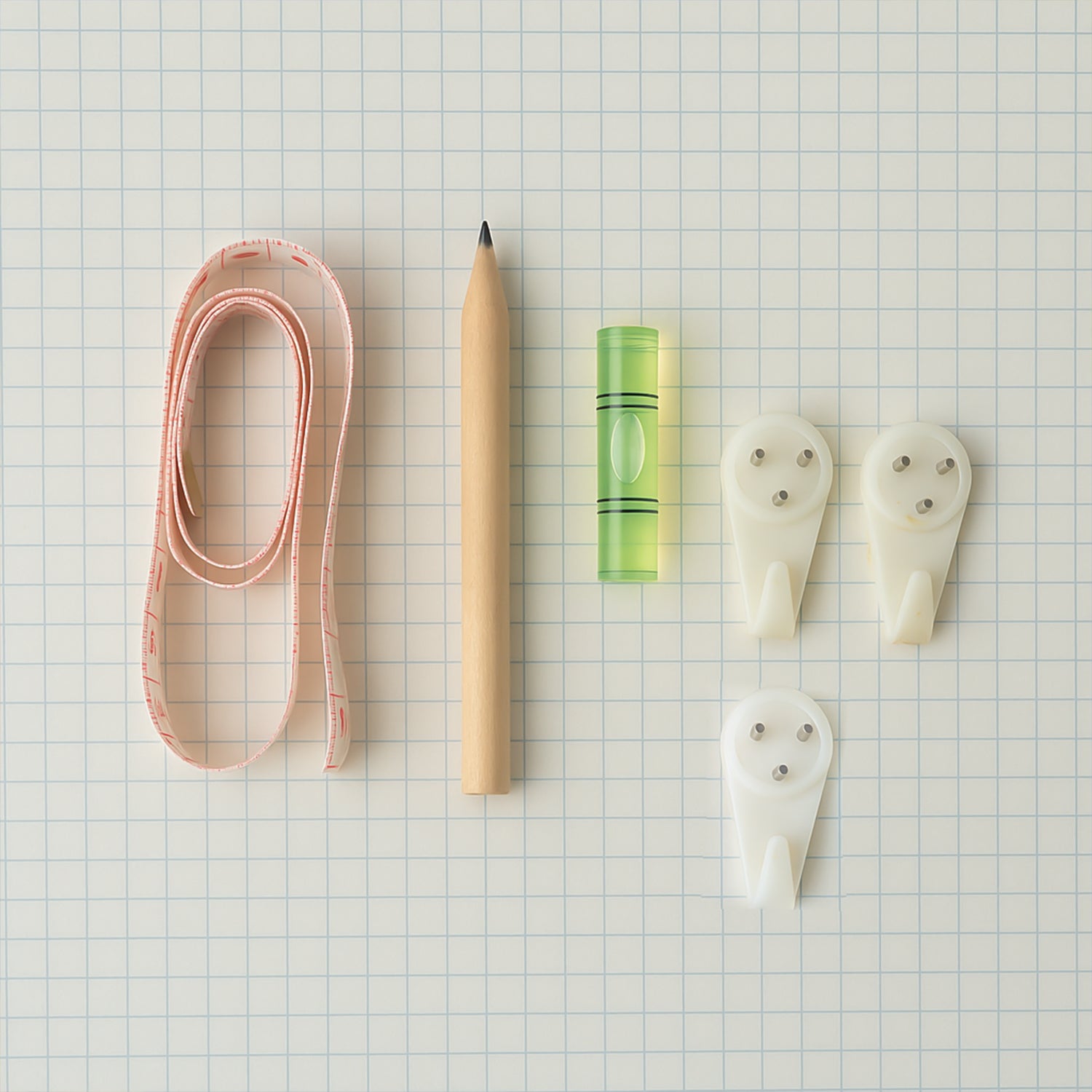 Wukusy 6-in-1 wall hanging measurement tool kit for home improvement, includes measuring tape, level, and other tools.