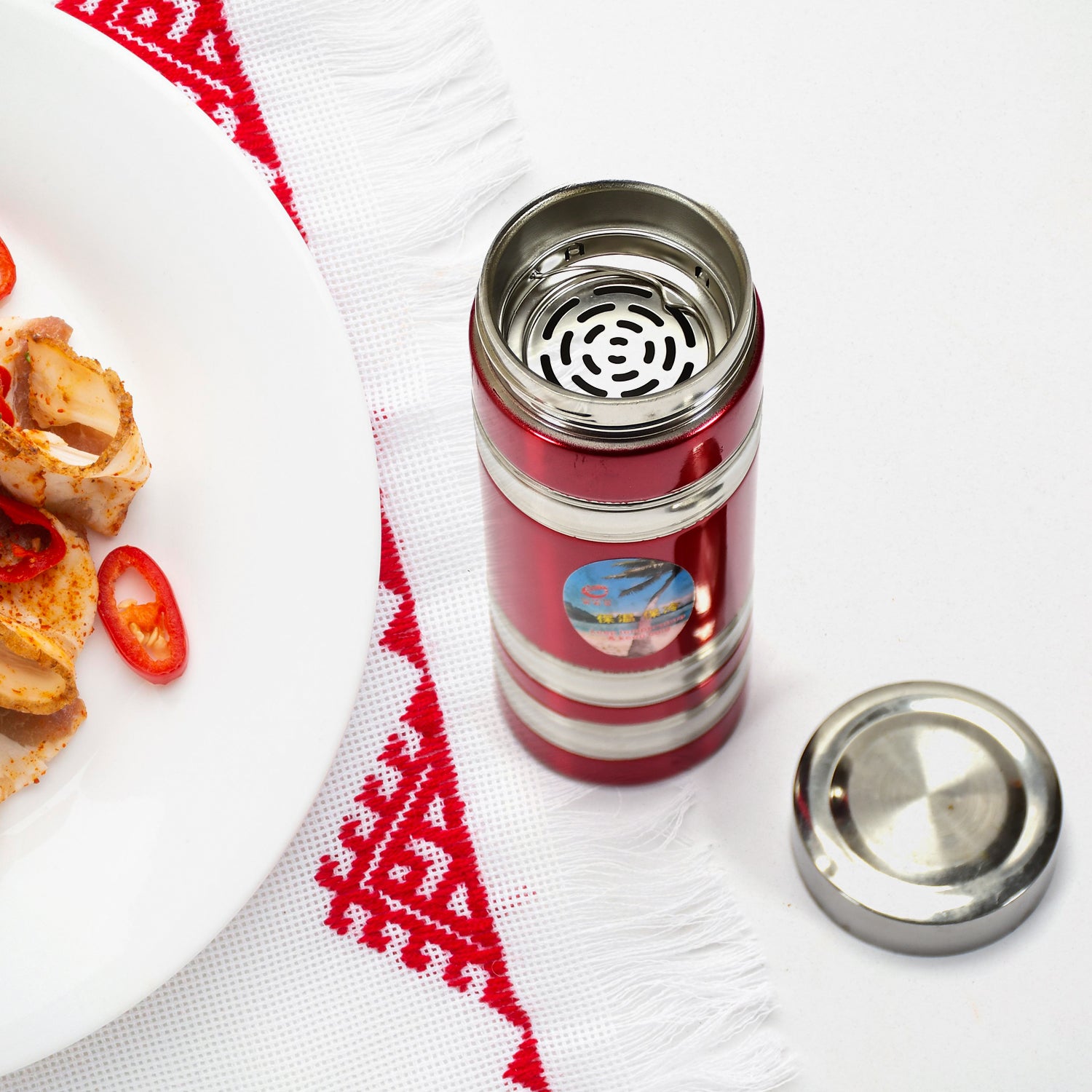 Mini stainless steel water bottle by Wukusy, 380ml, ideal for school and home use, featuring a sleek, durable design.