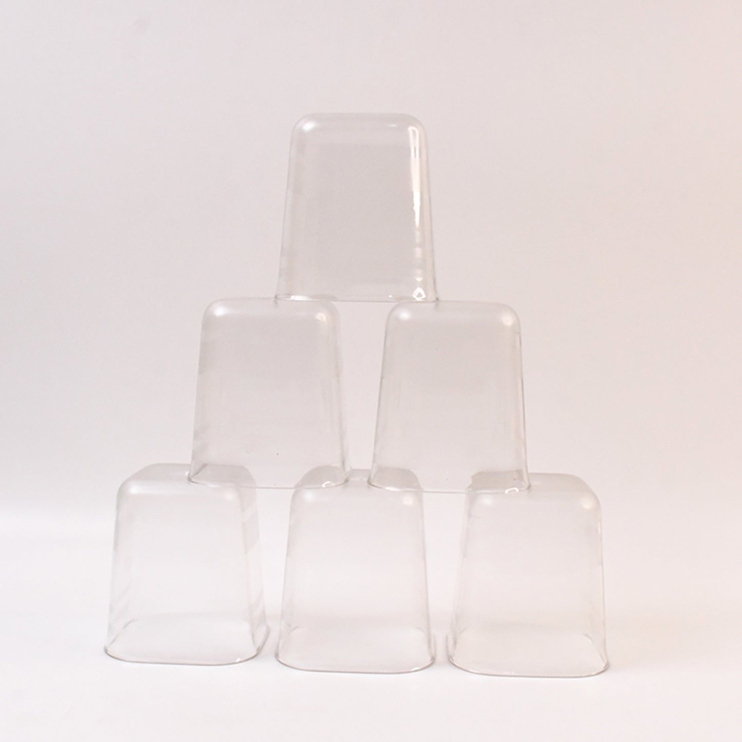 Six transparent diamond-shaped medium serving glasses by Wukusy for water, juice, and beverages in a home improvement setting.