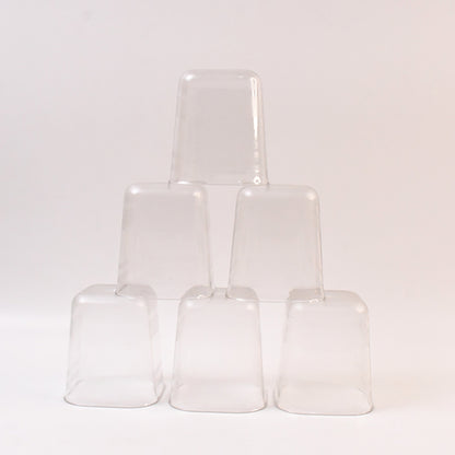 Six transparent diamond-shaped medium serving glasses by Wukusy for water, juice, and beverages in a home improvement setting.