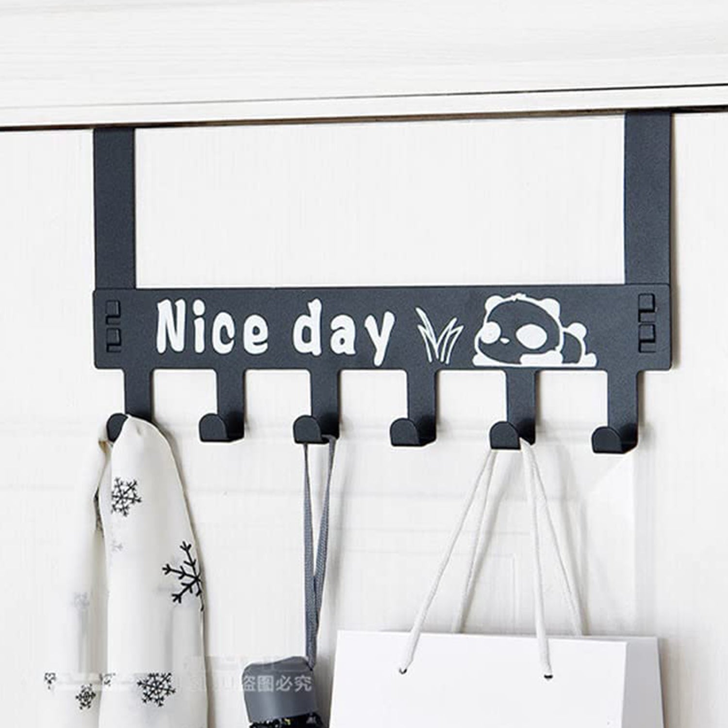 Heavy-duty Wukusy carbon steel over door hook rack with six hooks for towels coats scarves and clothing, ideal for home organization.