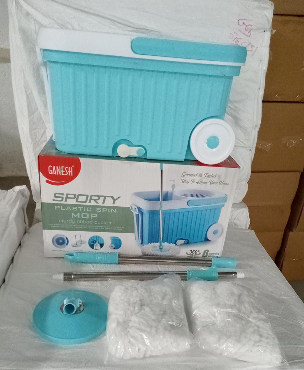 Wukusy 8712 Sporty Plastic Spin Mop with larger wheels and auto-fold handle for 360-degree cleaning, perfect for home improvement projects.
