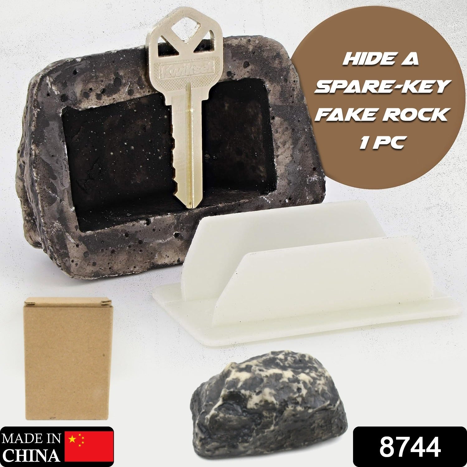 Wukusy weatherproof fake rock key hider designed to look like a real outdoor rock for discreet emergency key storage.