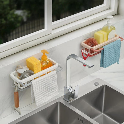 Wukusy plastic hanging drain rack with adhesive hook, retractable sponge holder, for organizing kitchen and bathroom dishcloths.