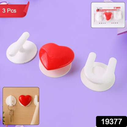 Wukusy adhesive wall hook set, 3-piece, for kitchen, bathroom, and home organization with sturdy, easy-to-apply hooks.