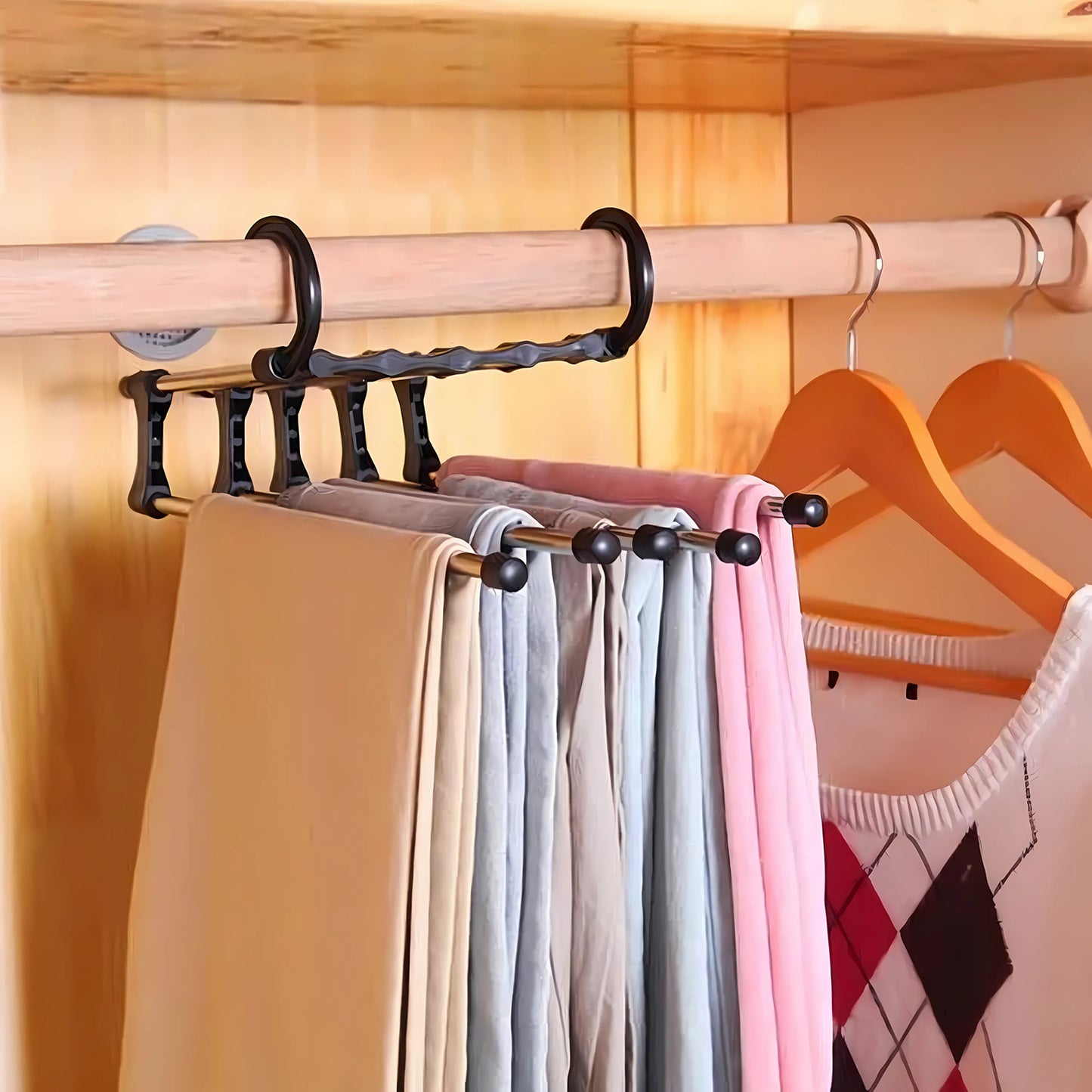 Adjustable Wukusy trouser pants hanger organizer with large clips for home improvement and clothing storage.