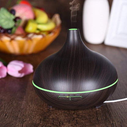 Wukusy aromatherapy humidifier with 7 colorful LED lights, 500ml capacity, remote control for home improvement and air humidification.