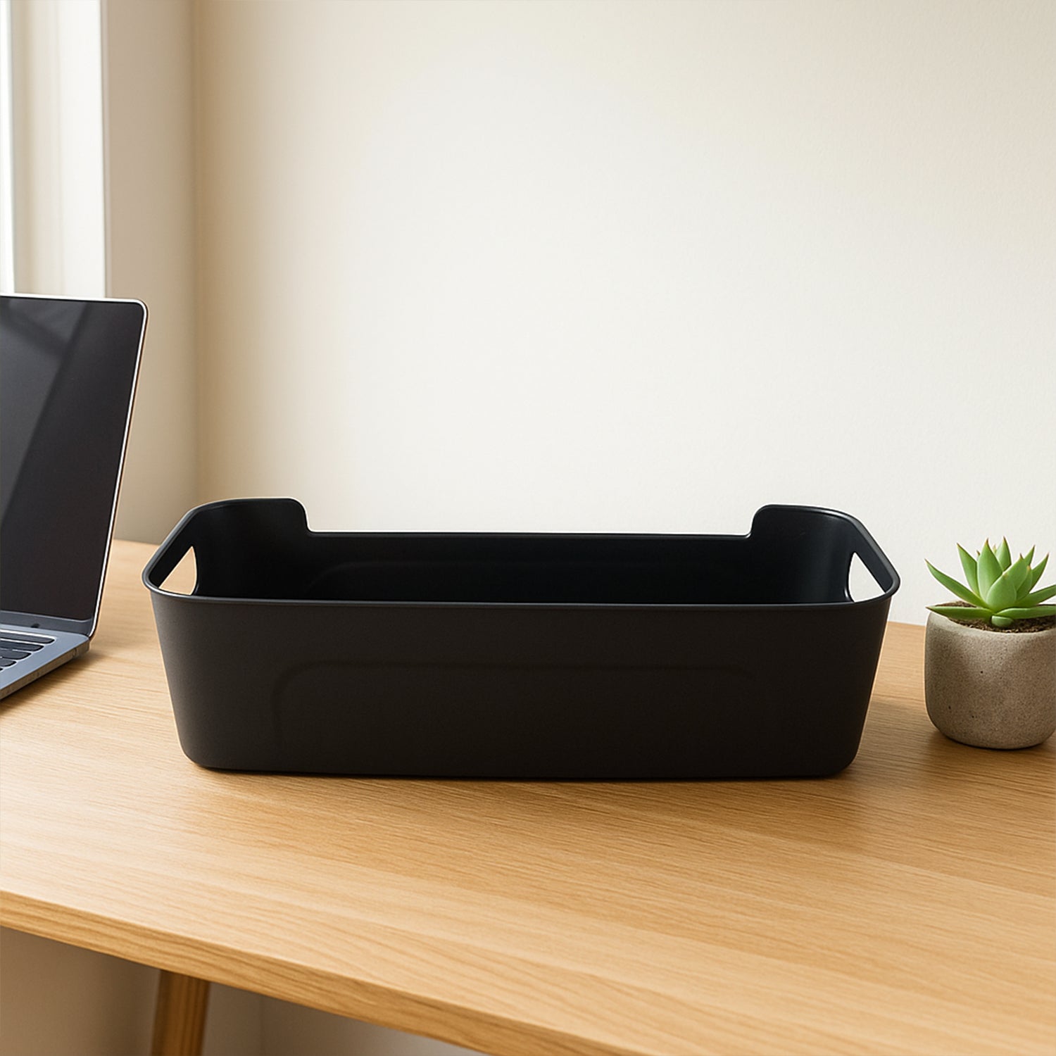 Set of four black plastic storage baskets and trays for organizing home, from Wukusy home improvement collection.