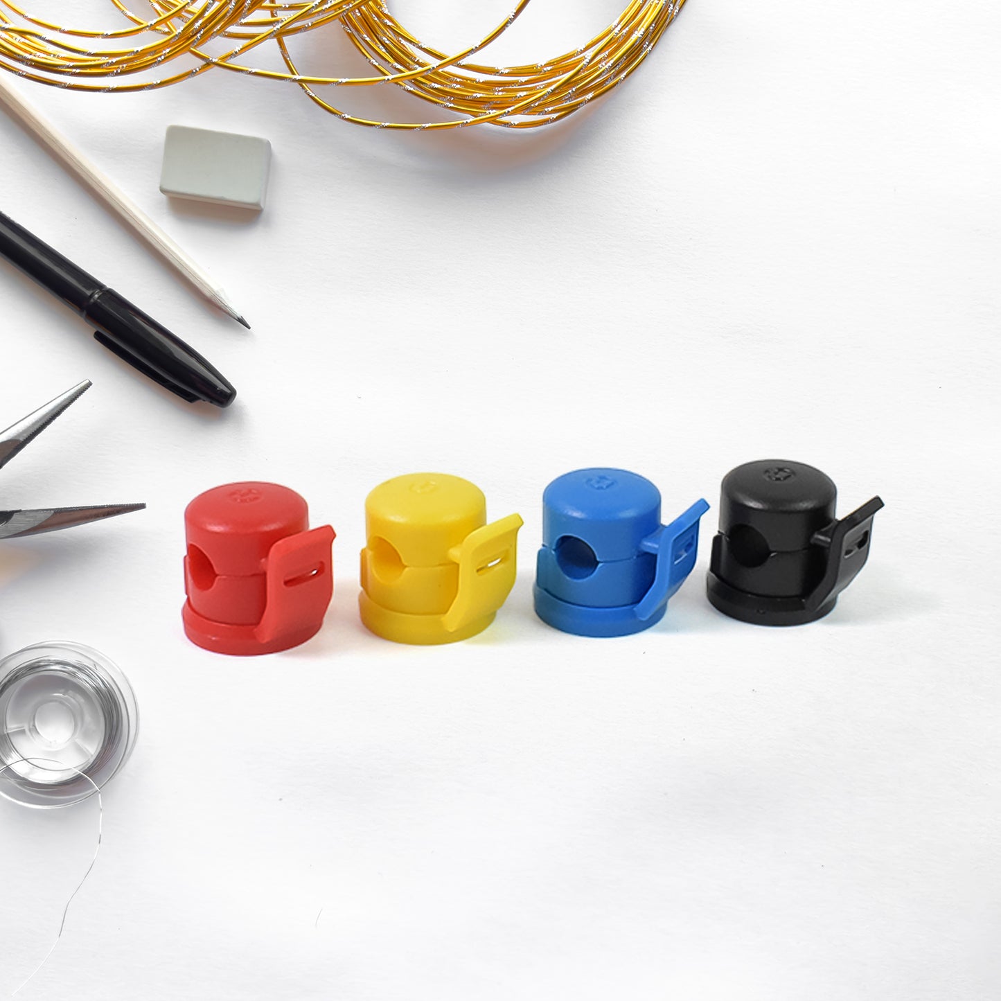 Wukusy adhesive cable holders, 4-piece set, for organizing and managing cables on home improvement projects.