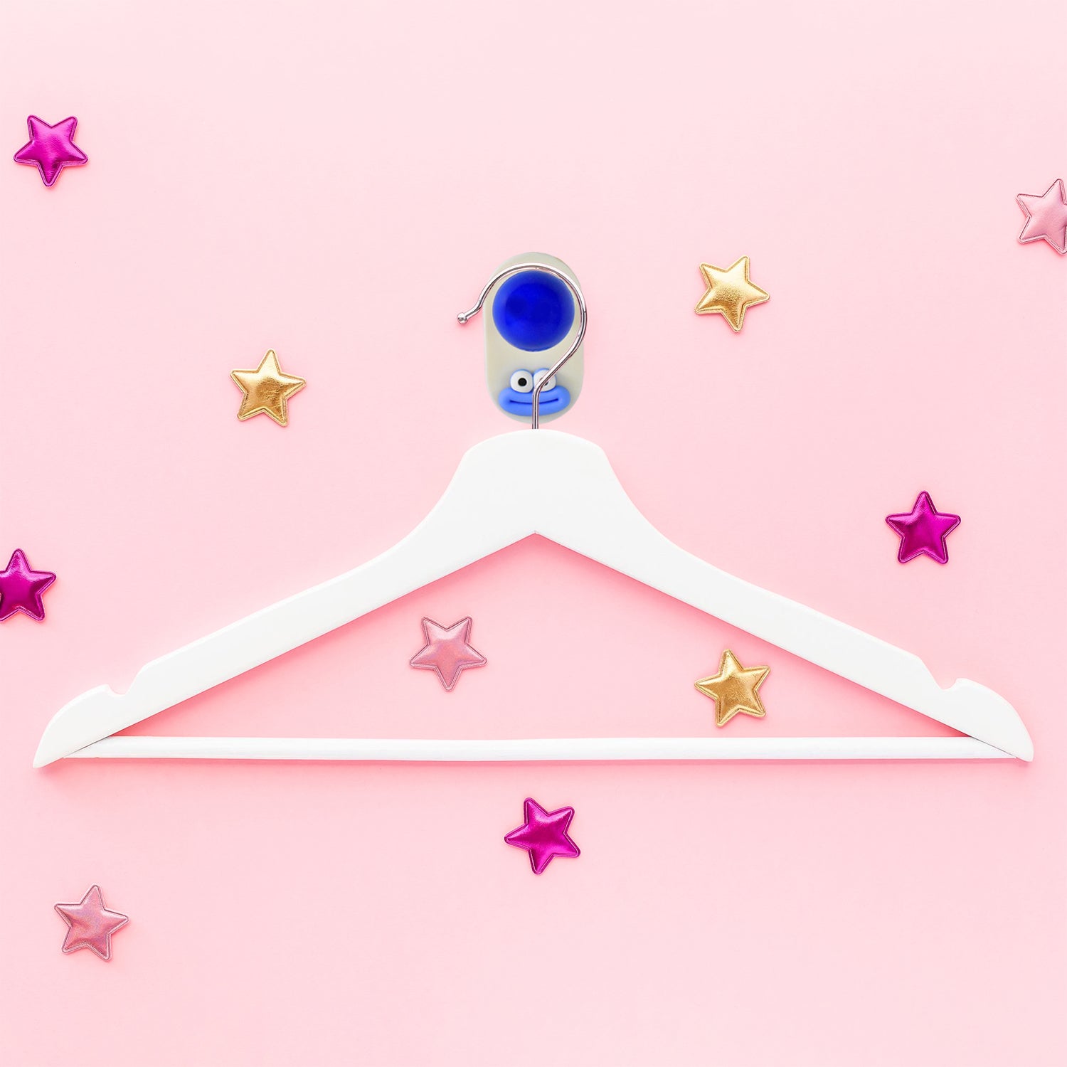 Colorful cartoon ball-shaped hook by Wukusy, self-adhesive for home improvement, perfect for hanging lightweight items.