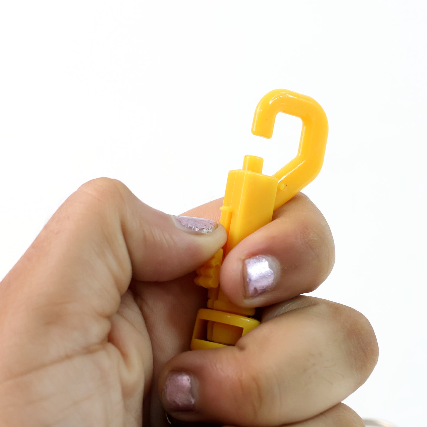 Wukusy coiled retractable keychain for home improvement, featuring a compact design with a sturdy attachment loop