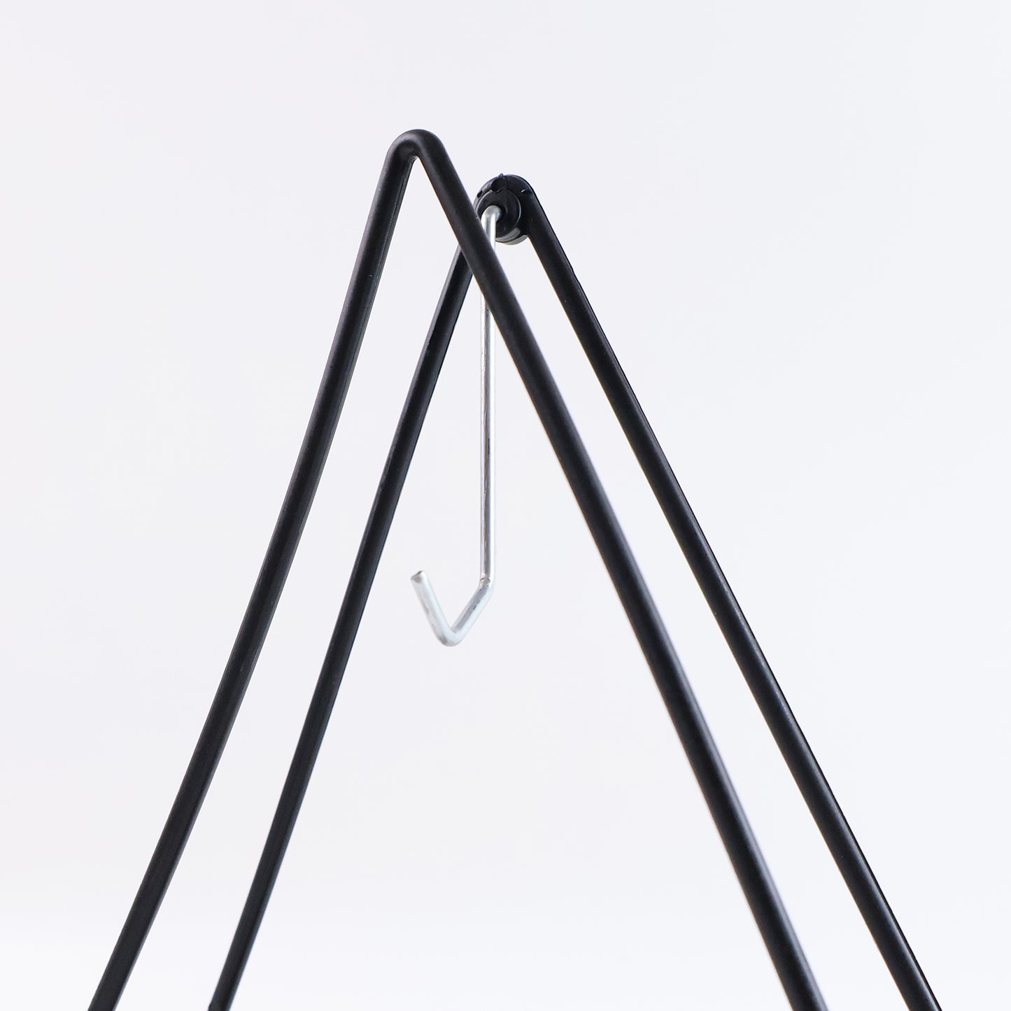 Wukusy compact triangle mosquito coil stand for home improvement, designed to hold mosquito coils safely and securely.