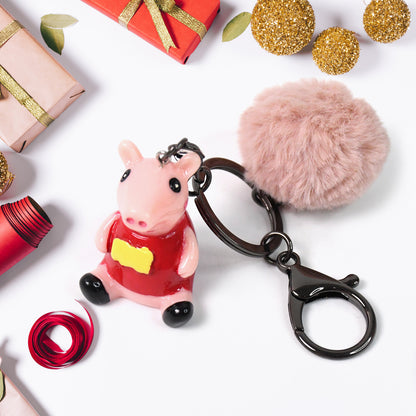 Cute cartoon keychain with fluffy pom from Wukusy, featuring a playful design, perfect for bags or keys.