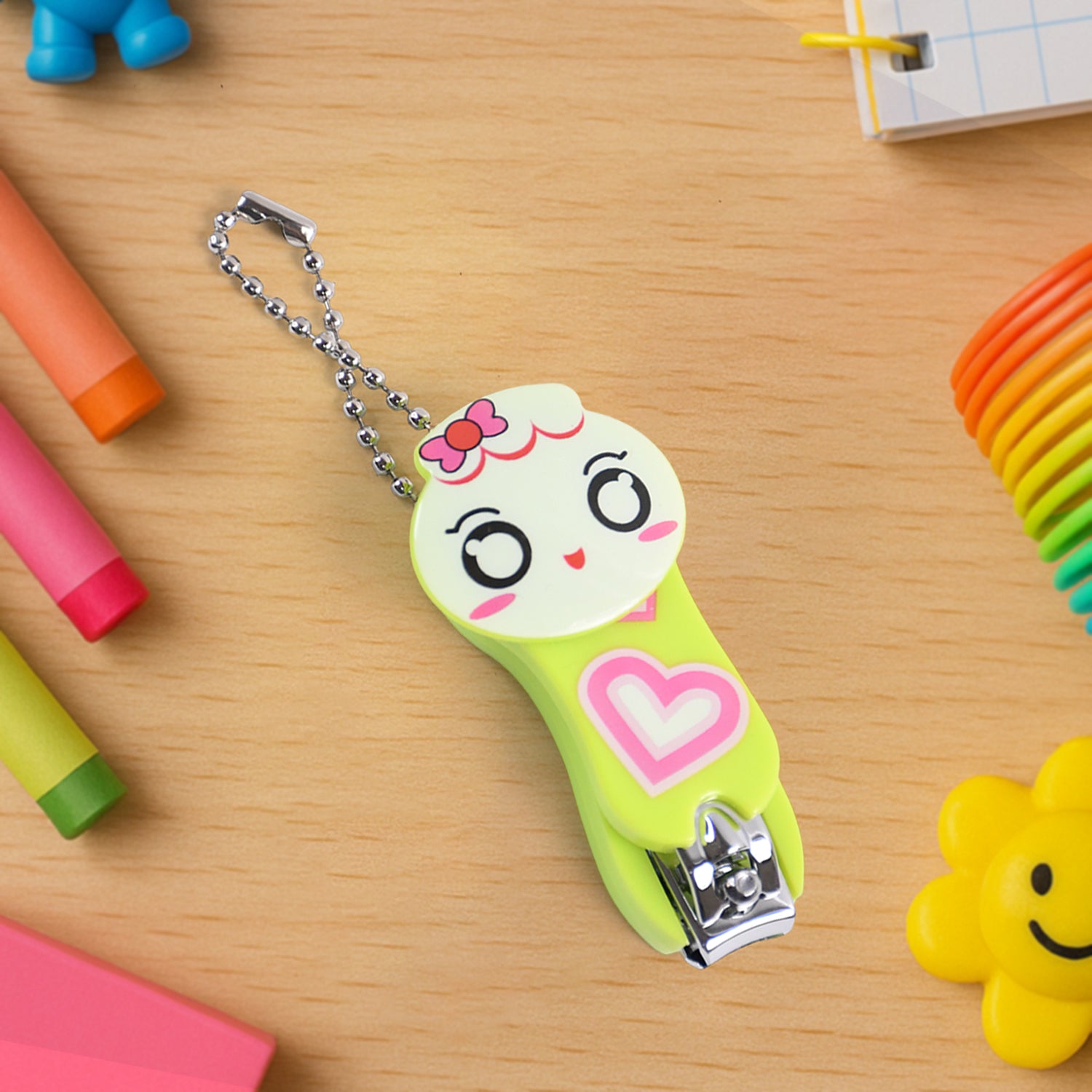 Cute cartoon nail clipper from Wukusy featuring a small cat, bear, or frog design, ideal for home grooming.