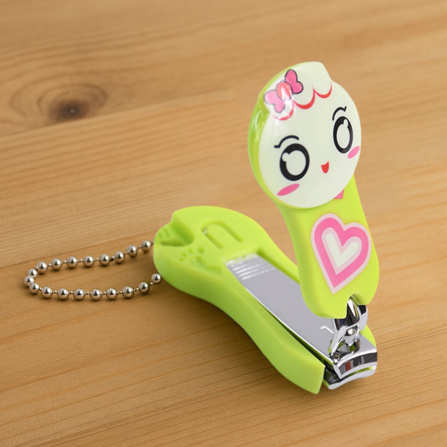 Cute cartoon nail clipper featuring a lovable cat, bear, and frog design, perfect for small home grooming tasks.