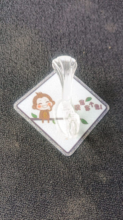Cute cartoon print transparent wall hook with self-adhesive back from Wukusy, ideal for home organization and easy wall mounting.