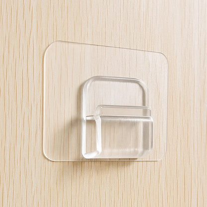 Transparent cartoon print wall hook with self-adhesive back from Wukusy, ideal for home organization and decorating walls.