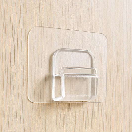 Transparent cartoon print wall hook with self-adhesive back from Wukusy, ideal for home organization and decorating walls.