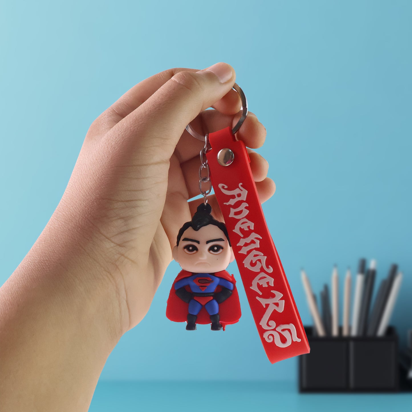 Cute cartoon silicone 3D key chain with metal hook and strap by Wukusy, perfect for home improvement or accessories.