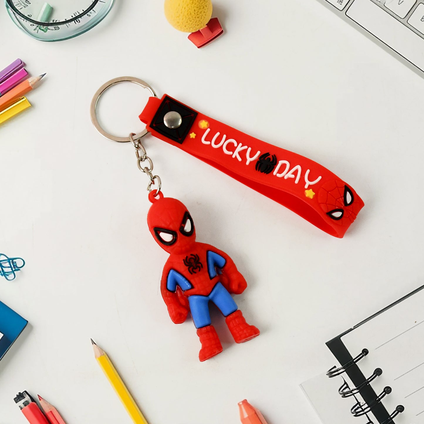 Cute cartoon silicone 3D key chain with metal hook strap by Wukusy, perfect for home improvement or accessories.