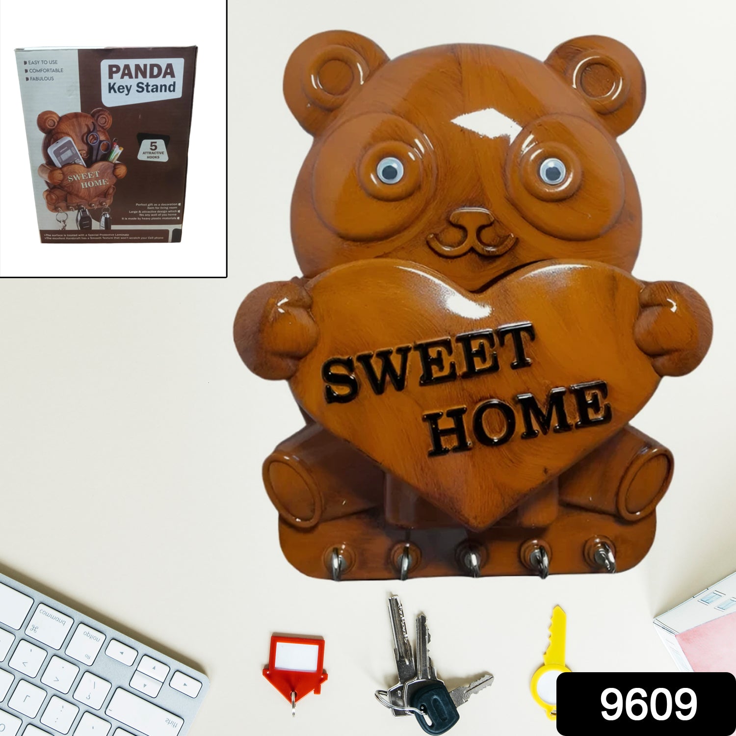 Cute plastic panda key holder wall rack with five hooks, ideal for organizing keys in a fun home improvement style.