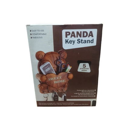 Cute plastic panda wall key holder with five hooks, perfect for organizing keys and small items in home improvement spaces.