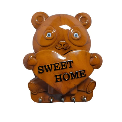 Cute plastic panda wall key holder with five hooks, ideal for organizing keys and small items in home improvement spaces.