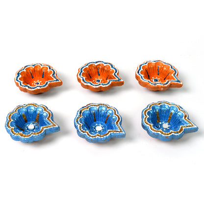 Set of 6 handmade decorative clay Puja diyas for Diwali, painted by Wukusy, ideal for home improvement and festive lighting.