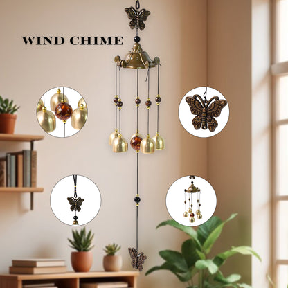 Wukusy decorative outdoor wind bell chimes hanging on a porch, metal with intricate designs, adding charm to home outdoor decor.