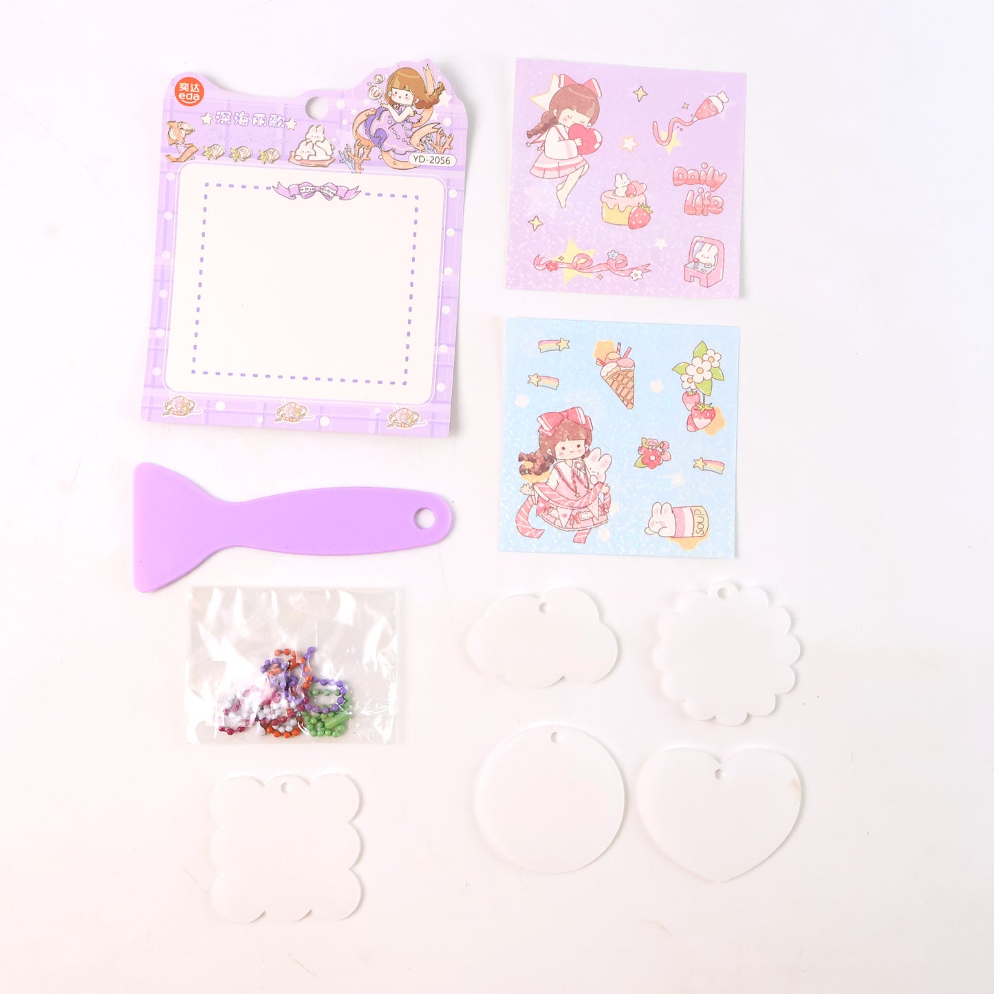 Wukusy DIY Shrink Art Keychain Making Kit for Kids, home improvement craft set with colorful shrink plastic and keychain accessories.