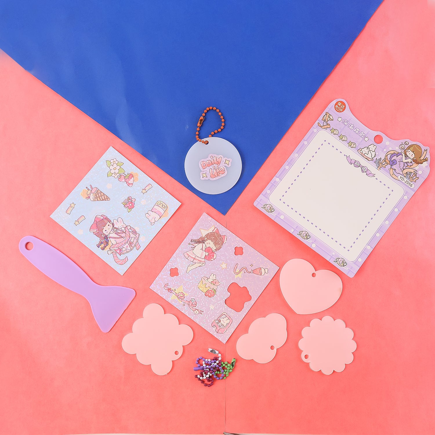 Wukusy DIY Shrink Art Keychain Making Kit for Kids, home improvement craft set with colorful supplies and keychain accessories.