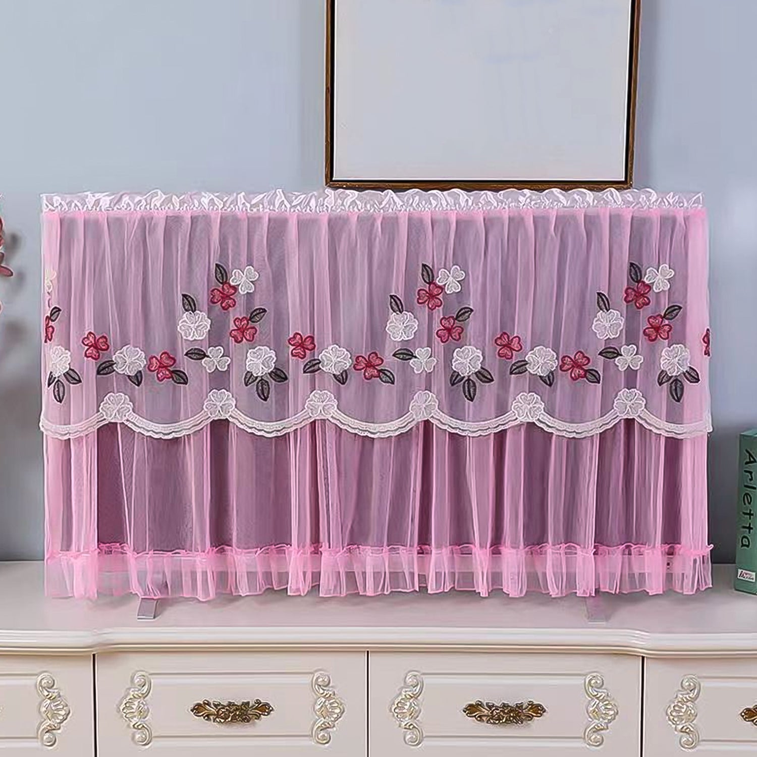Wukusy 65-inch dustproof cloth cover protecting indoor TV screen from dust and scratches in a home setting