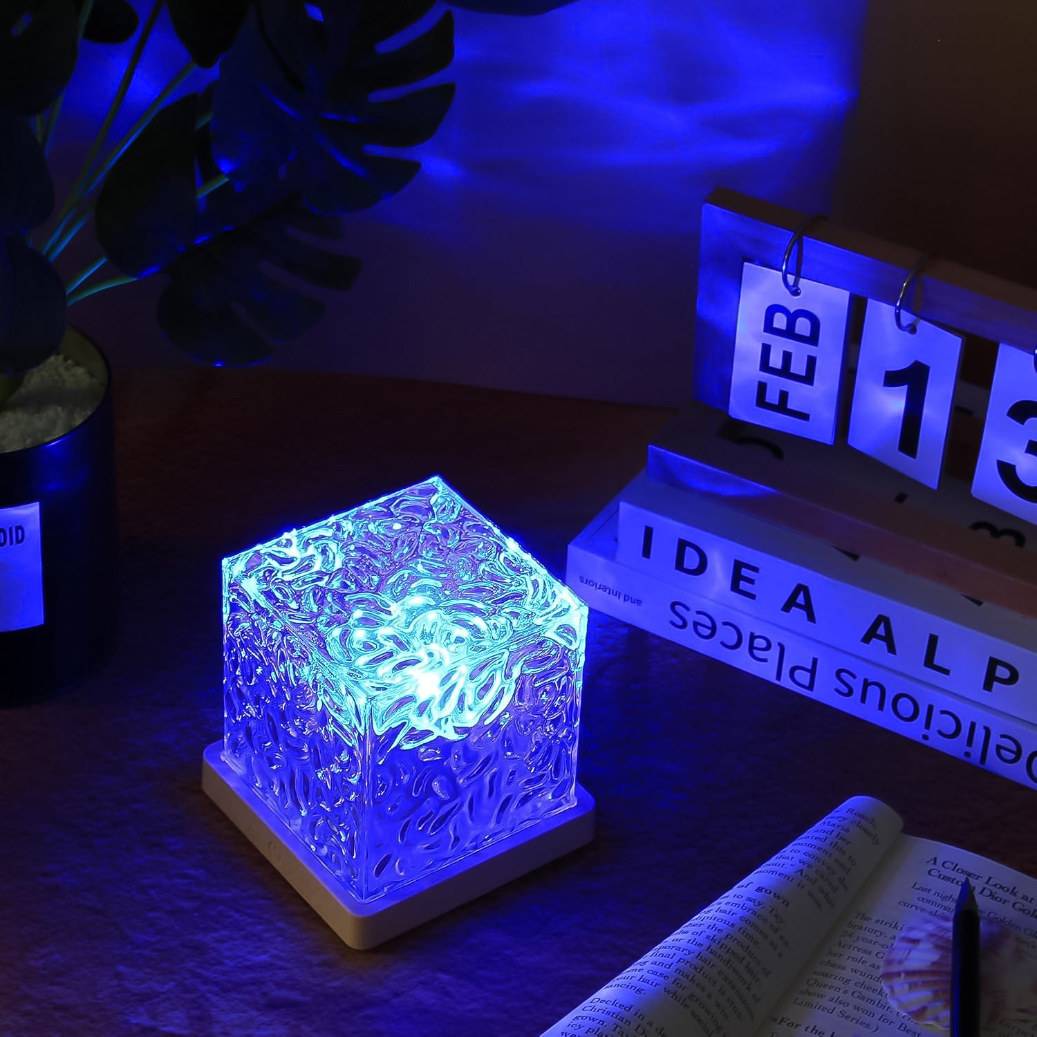 Wukusy dynamic rotating water ripple night lamp with remote control, creating soothing light effects for home decor.