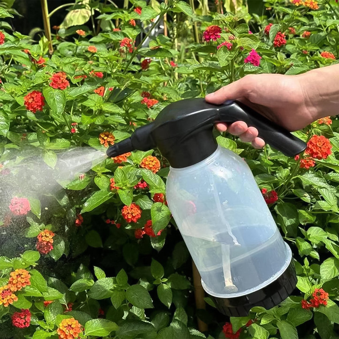 Wukusy electric garden sprayer bottle, 2-liter capacity, used for gardening and home improvement tasks.